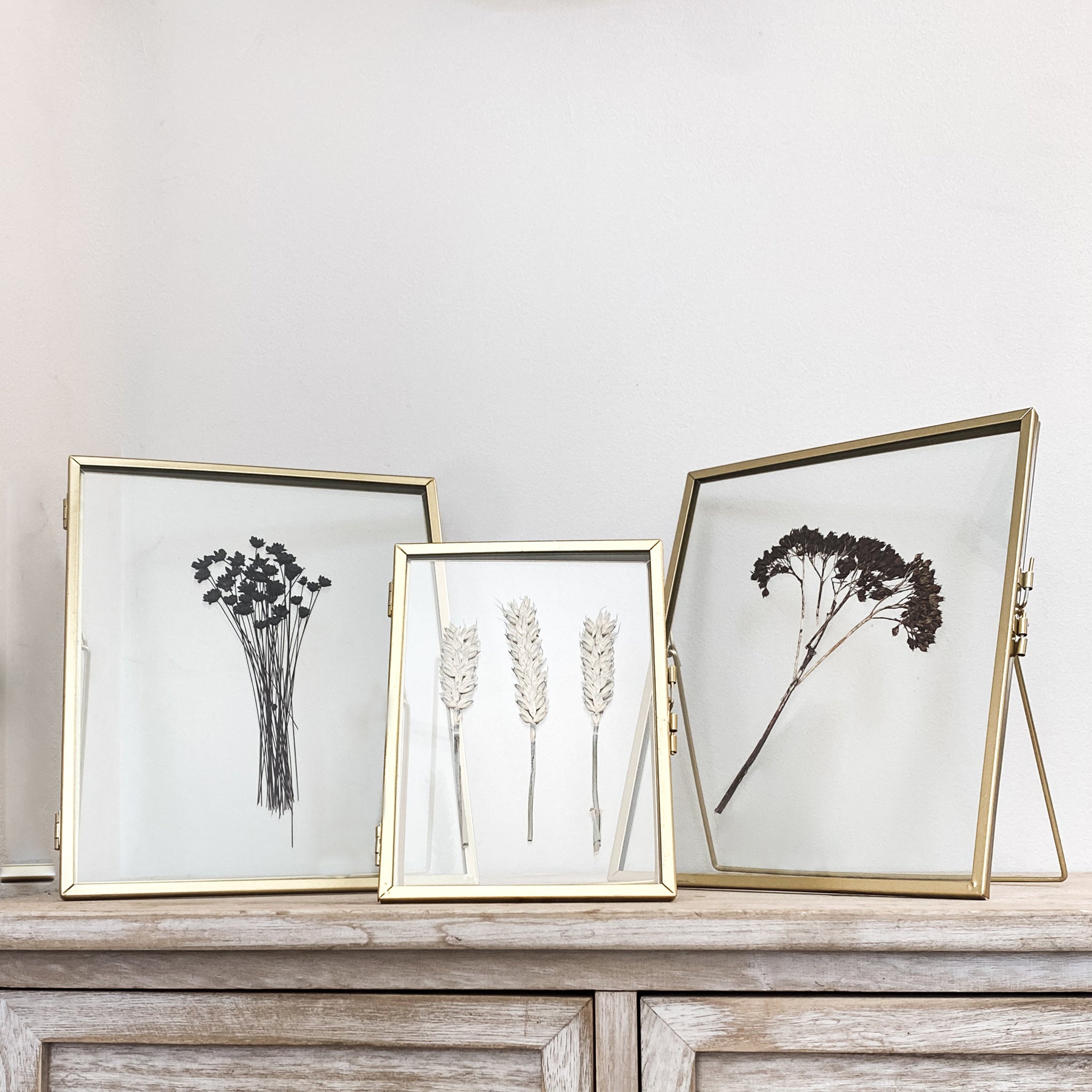 Set Of Three Gold Pressed Flower Frames: Dried Buddleia & Natural Wheat