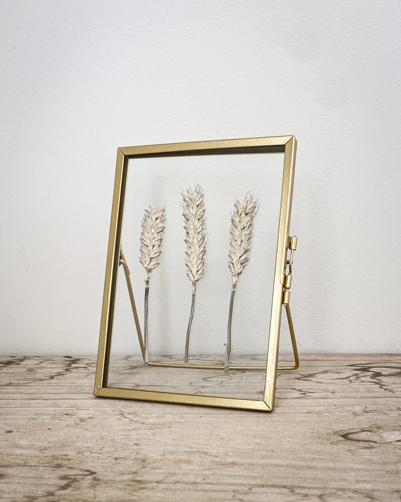 Set Of Three Gold Pressed Flower Frames: Dried Buddleia & Natural Wheat