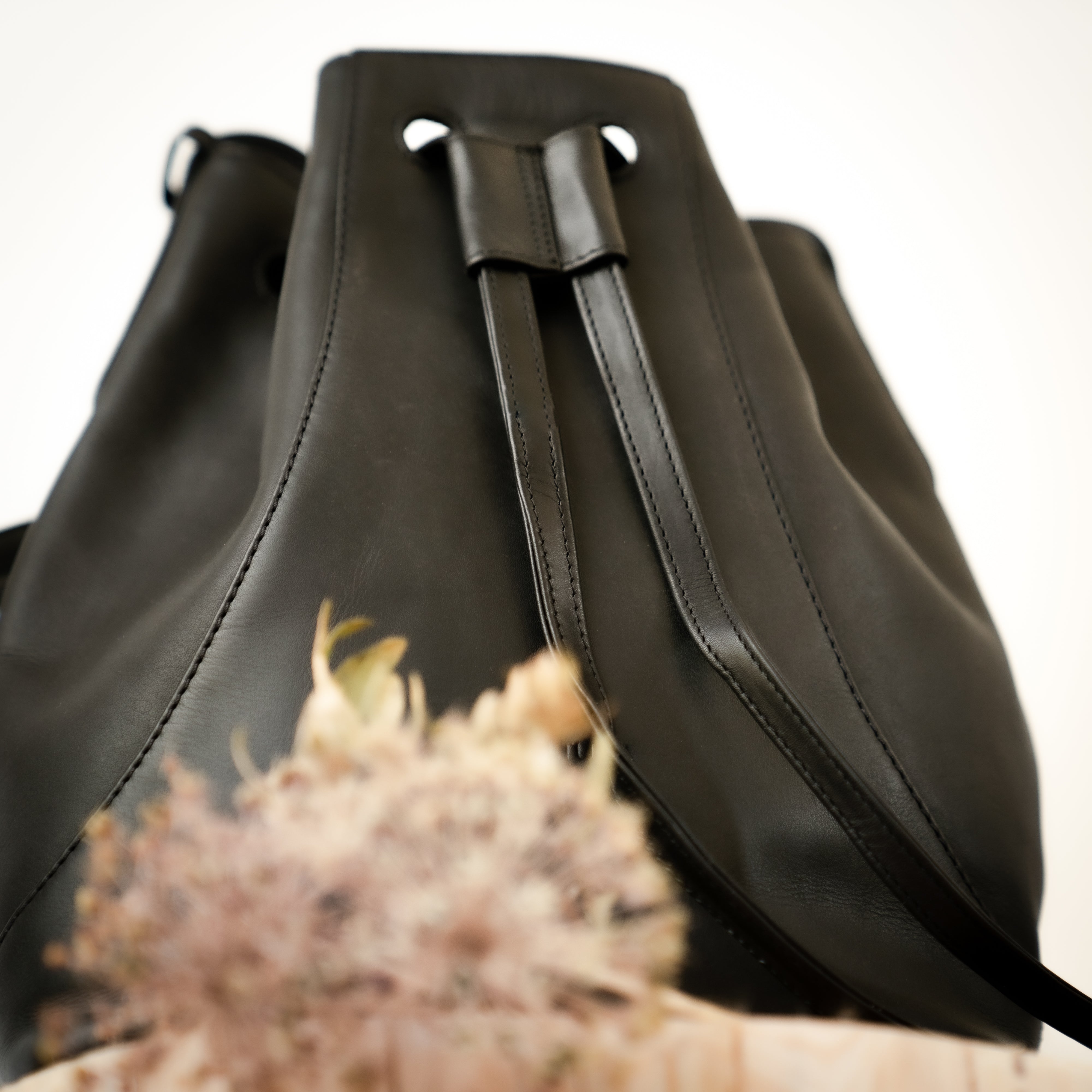 Black leather online drawstring bucket bag